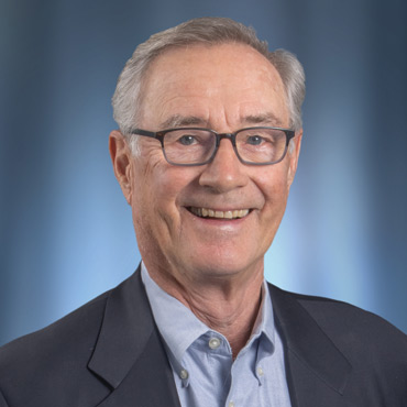 Tom E. Sween, Chairman of the Board
